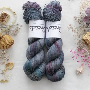 "Bahar" - merino sw/nylon/Bronze stellina 400m