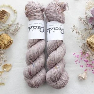 "Romance" - merino sw/nylon/Bronze stellina 400m
