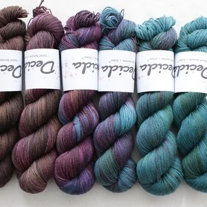 "Fade 3" 600g - merino sw/nylon/Bronze stellina 400m