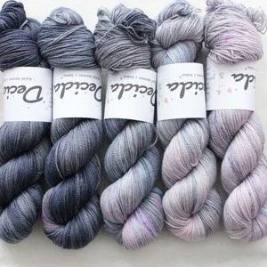 "Fade 4" 500g merino sw/nylon/Bronze stellina 400m