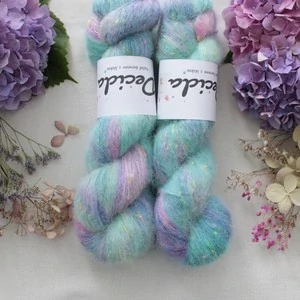"V kapkách" - 42% merino sw 32% alpaka 18% donegal nopky 8% len 400m