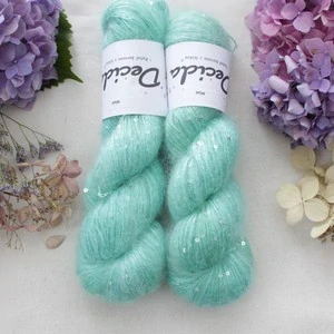 "Mint" - 34% superkid mohér 11% hedvábí 41% nylon 14% polyester 195m/50g