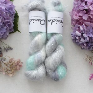 "Stříbrný vítr" - 34% superkid mohér 11% hedvábí 41% nylon 14% polyester 195m/50g