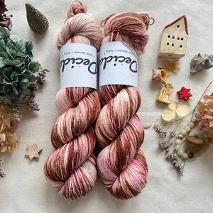 "Sugar Noel" - 100g Merino sw/Nylon/Zlatá stellina 400m