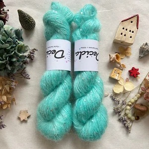 "Mint 2" - 34% superkid mohér 11% hedvábí 41% nylon 14% polyester 195m/50g