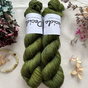 "Olive Crown" - 75% merino sw 20% nylon 5% zlatá stellina 400m