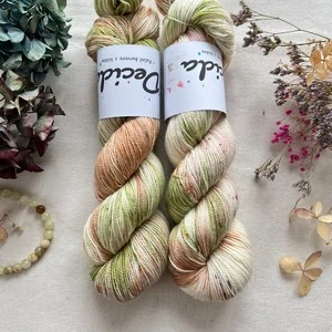 "Botanical Ivory" - 75% merino sw 20% nylon 5% zlatá stellina 400m