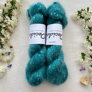 "Lagoon Pulse" - 34% superkid mohér 11% hedvábí 41% nylon 14% polyester 195m/50g