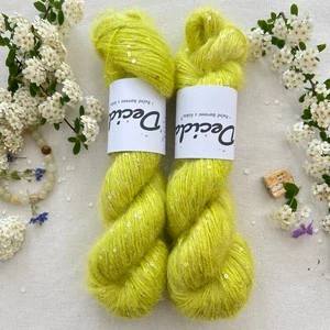 "Eletric Lime" - 34% superkid mohér 11% hedvábí 41% nylon 14% polyester 195m/50g