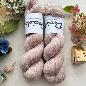 "Dune Whisper" 60% merino 20% hedvábí 20% len 400m