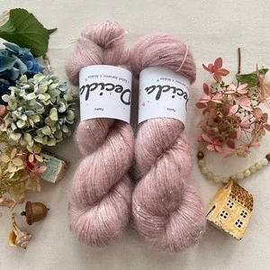 "Tavira" - 34% superkid mohér 11% hedvábí 41% nylon 14% polyester 390m/100g