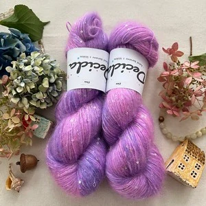 "Elvia" - 34% superkid mohér 11% hedvábí 41% nylon 14% polyester 390m/100g