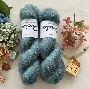 "Menton 2" - 34% superkid mohér 11% hedvábí 41% nylon 14% polyester 390m/100g
