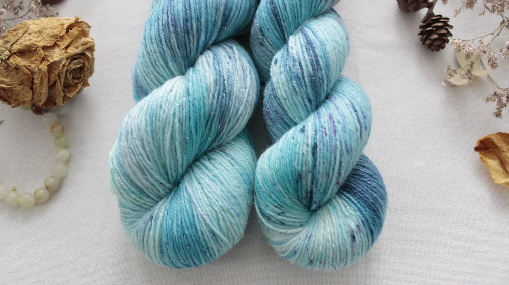 "Seaside" - EXTRA Merino sw/polyamid/Lurex 400m/100g