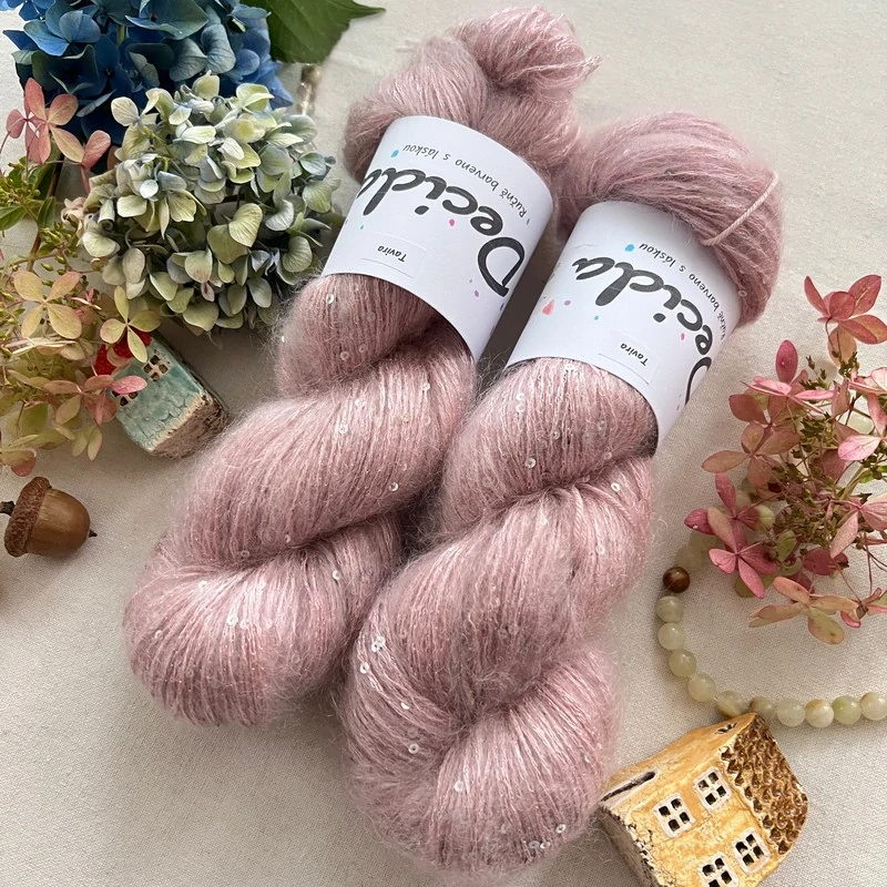 "Tavira" - 34% superkid mohér 11% hedvábí 41% nylon 14% polyester 390m/100g