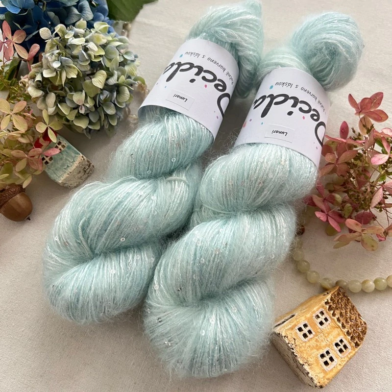 "Lunari" - 34% superkid mohér 11% hedvábí 41% nylon 14% polyester 390m/100g