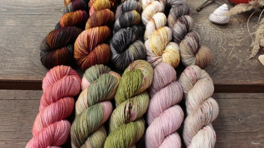 "Speckled green" - Merino sw/polyamid 270m/100g