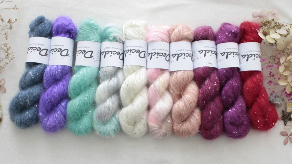 Přírodní nebarvená - 34% superkid mohér 11% hedvábí 41% nylon 14% polyester 195m/50g 
