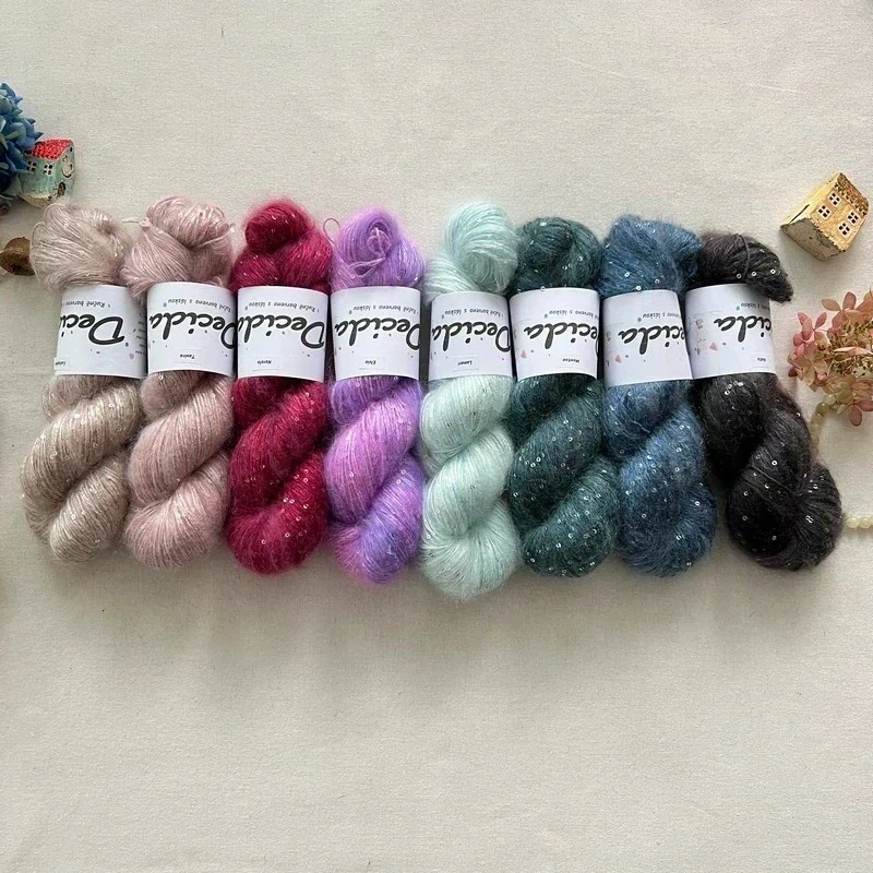 "Cadaques" - 34% superkid mohér 11% hedvábí 41% nylon 14% polyester 390m/100g